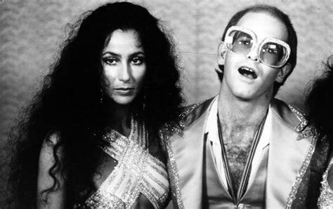 See more ideas about tattoos, cool tattoos, portrait. Cher and Elton John in 1975 | Elton john, Pop singers, Singer
