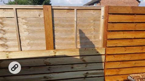 You can use them as a cover on top of your. Covering up old fence panels with the contemporary batten ...