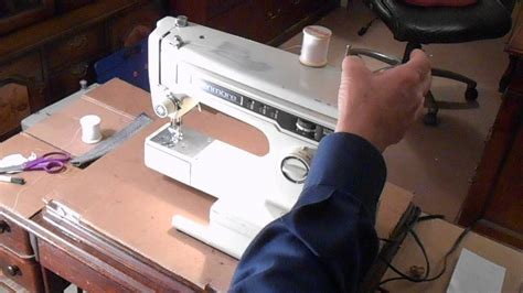 Keep hanging onto that thread and push down on your foot pedal. How to wind a bobbin on a kenmore sewing machine the ...