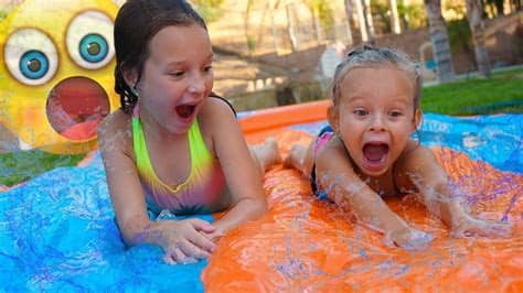 All you need to make this fun waterslide is a roll of visqueen from your local hardware store, tarps, a 2x4 and ground. SISTERS BIGGEST SLIP N SLIDE! 💦 Giant Backyard Waterpark ...