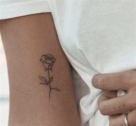 Pink roses symbolize innocence, a new love, or remembrance of a loved one. Pin on Dainty tattoos