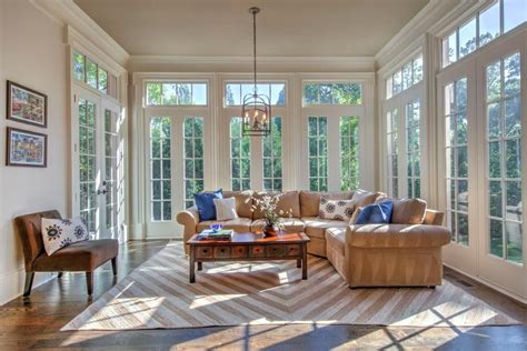 9 foot ceiling = 12 inch down rod; In love with this living room... The floor-to-ceiling windows allow for so much light to shine ...