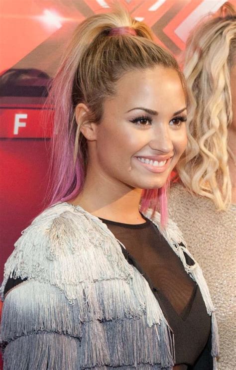 This time the colours are a warm brown with fabulous copper highlights around the top and a lovely caramel blonde from chin level down to the ends. Demi Lovato, Pink Hair - The Hollywood Gossip