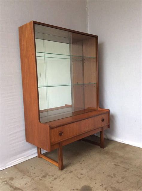 The moen glass shelf will instantly completethe moen glass shelf will instantly complete your bathroom area. Mid century 1960s Teak glazed mirrored bookcase display ...
