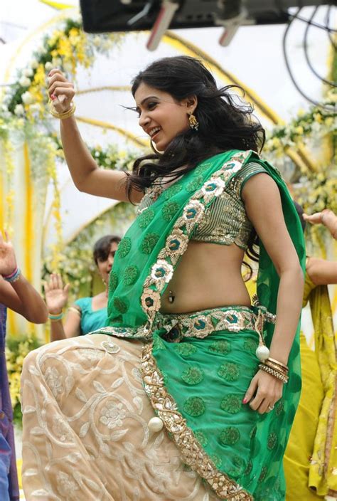 She has established a career in the telugu and tamil film industries. samantha navel