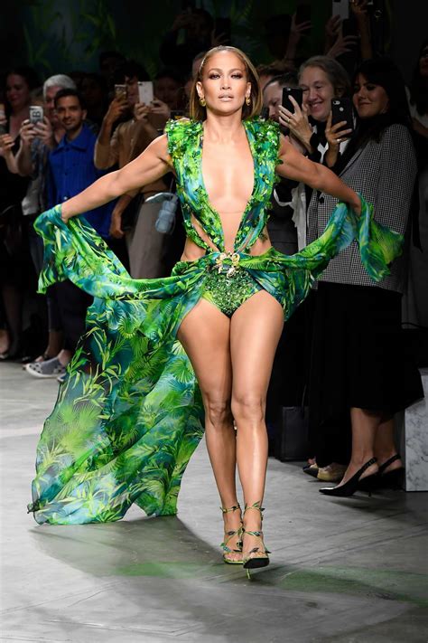 Jennifer lopez | angela weiss/afp via getty. jennifer lopez walks the runway at the versace show during ...