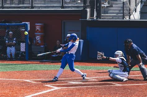 What is the size of home plate in women's softball? Softball rolls through the Big East • The DePaulia