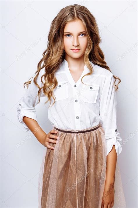 The of 13 year old girls are more pronounced than do boys. A beautiful blond-haired 13-years old girl in studio on ...