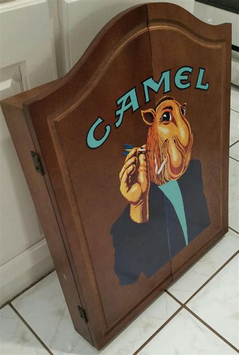 Individual cigarettes of the brand are often referred to colloquially as luckies. Vintage Joe Camel Cigarettes DartBoard & Wooden Cabinet ...