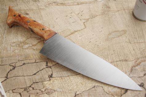 These are carbon steel, not stainless, so in general this means they'll take an edge easily and keep it longer than an equivalent stainless steel knife, but they will rust and turn black and pit more easily, so you'll need to take extra. Handmade kitchen knife 200mm long blade O1 high carbon ...