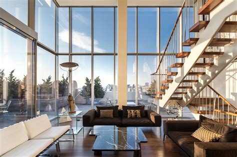 The use of clean lines inside and out, without any superfluous decoration, gives each of our modern homes an uncluttered frontage and utterly roomy, informal living spaces. Photos: NYC Sky Lofts glass penthouse Axe lives in on ...