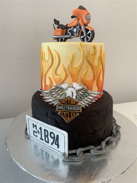 Molten chocolate cakes, fallen cakes, lava cakes, or fondants. Benefit cake. Harley-Davidson themed. Bottom tier ...