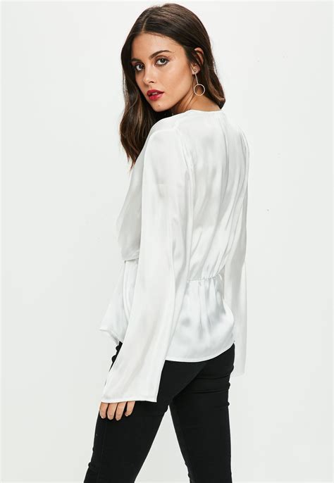 Stare down her blouse to check out her small breasts. Missguided White Satin Chiffon Drape Blouse - Lyst