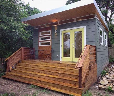 Tiny houses make great guest cottages, garden houses, and pool houses. Pictured: 14x16 Modern Studio Luxe complete with a full ...