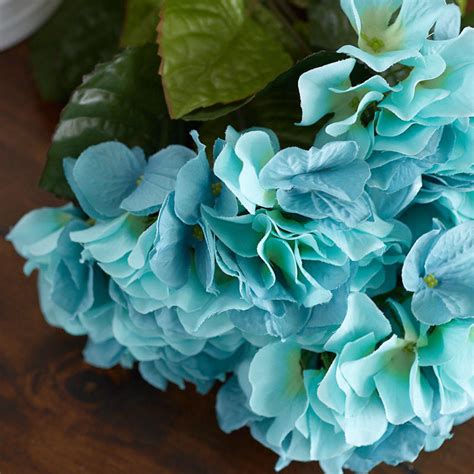 This rose bush can go in a vase by itself or can be combined with other artificial flowers and greenery to create a beautiful arrangement or centerpiece. Faux Teal Hydrangea Silk Flower Bush - Bushes + Bouquets ...
