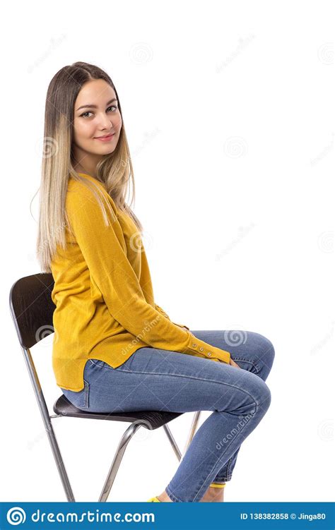 Maybe you would like to learn more about one of these? Beautiful Young Girl Posing On A Chair Over White ...