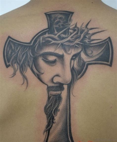 Colored jesus tattoo on arm. 82 Delightful Jesus Tattoos For Back