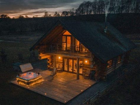 Enjoy walks after dinner then come back home to unwind in your tub. Riverside Log Cabin with Hot Tub in Rural Cumbria