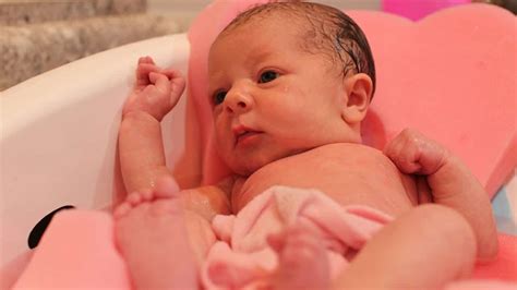 Grab a change of clothes, a clean diaper, a couple of washcloths, another big towel, a mild baby soap, and a bowl or cup of warm (not hot) water. Newborn Baby's First Bath - Ebaby.com Videos | Babys first ...