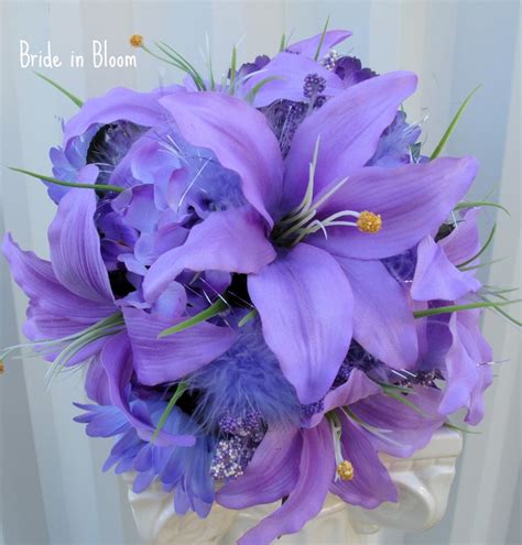 Calla lily wedding favors will dress your reception tables with traditional elegance. Feather wedding bouquet periwinkle lavender bridal ...