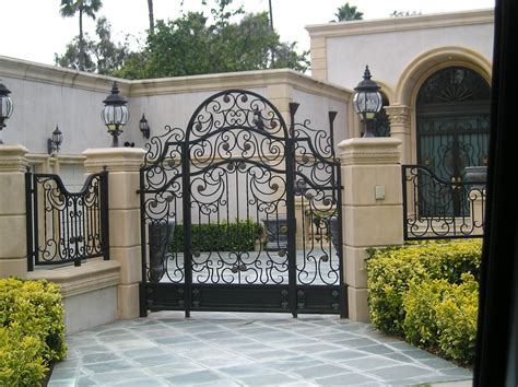 A modern grey gate aluminum portal with blades suburbs house street. architecture-electric-gate-steel-and-metal-design-driveway ...