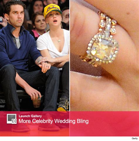 Kaley cuoco is officially off the market! Kaley Cuoco Debuts Massive Wedding Ring at Lakers Game ...