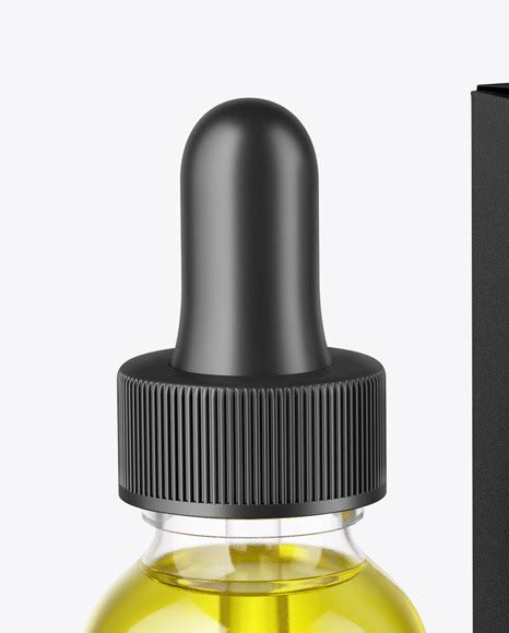 Download Glass Dropper Oil Bottle with Paper Box Mockup in Bottle Mockups on Yellow Images Object Mockups