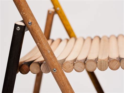 Towels, coats, hats, scarves etc. Old handles of brooms turned into chair by Reinier de Jong ...