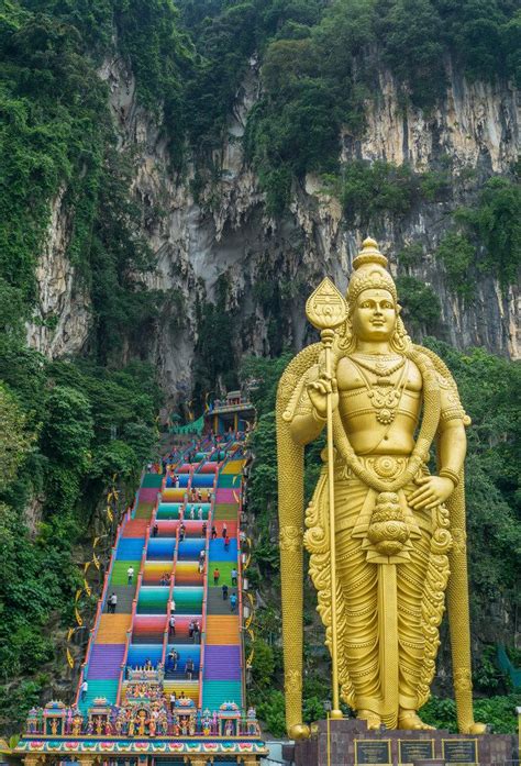 | guarded by a monumental statue of hindu deity lord murugan, the batu caves are a malaysian national treasure and an unmissable day trip from kuala lumpur. Hindu Temple at Batu Caves in Kuala Lumpur - Creative ...