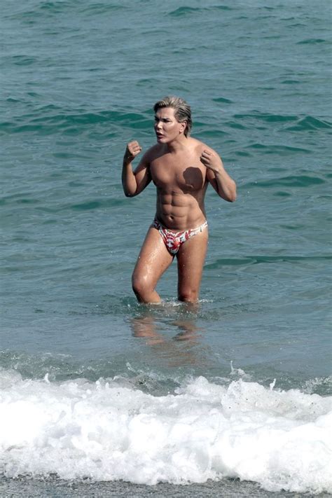 Human ken doll and plastic surgery addict, rodrigo alves showed off his fake six pack as he enjoyed a sunny friday on the beach in marbella. Human Ken Doll Rodrigo Alves shows off surgically-enhanced ...