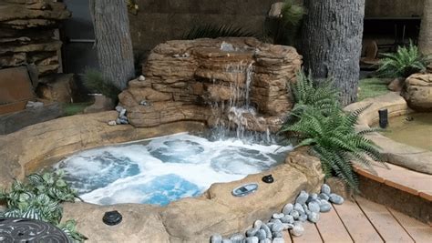 Hot tubs, swim spas, hot tub chemicals, accessories and parts. Small Custom Rock Hot Tub & Spa | Universal Rocks