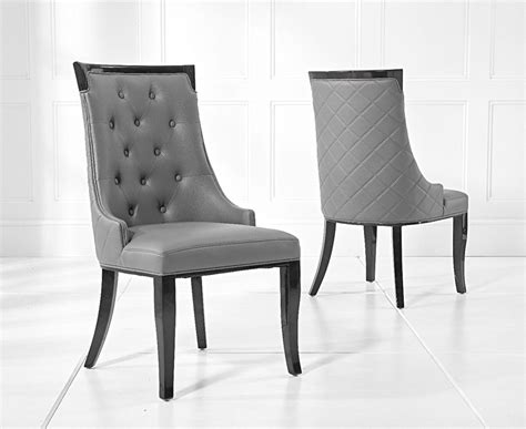 The white marble top contrasts dramatically with the black upholstered parsons chairs to bring your dining. Raphael 200cm White Pedestal Marble Dining Table with ...