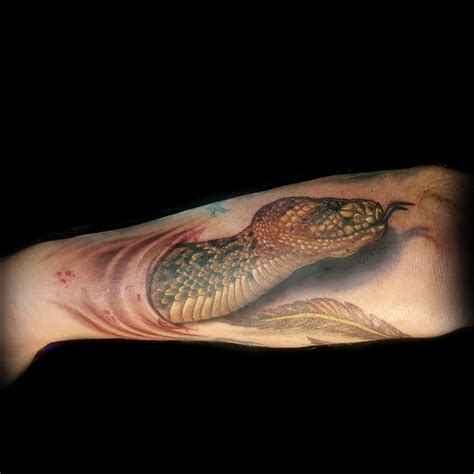 Maybe you would like to learn more about one of these? realistic 3d snake tattoo done in San Francisco at Masterpiece Tattoo