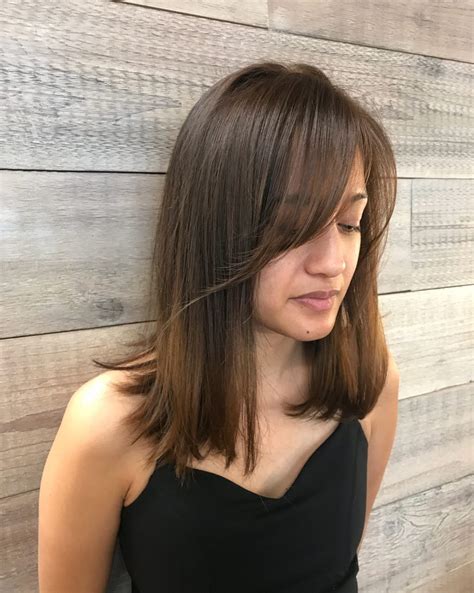 The long bob, also known as the lob, is nothing but a combination of the bob cut and long hair.add side bangs to this layered hairdo and you have the chicest hairstyle in town! Side-Swept Bangs: 43 Ideas That Are Hot in 2018