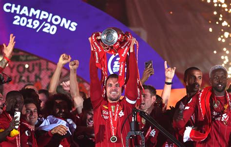 This page is about liverpool, (soccer/england). Photo gallery: Liverpool lift the Premier League trophy at ...