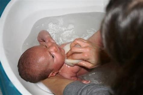 These reactions are normal and will soon go away. Bathtime for baby | Baby | Health for Under 5s