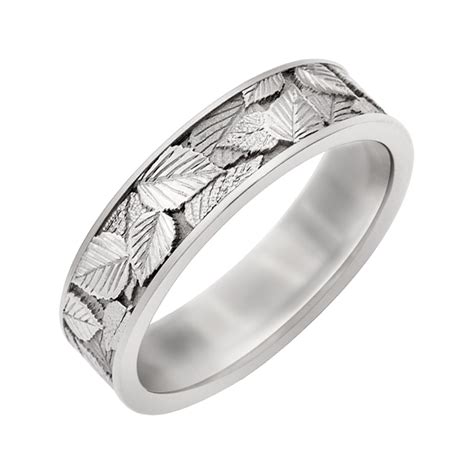 The only way to avoid scratches on your wedding band is to 1) choose a stainless steel wedding ring, 2) have a textured finish. Leaf scratched gold ring for women - Three Snails | Rings ...