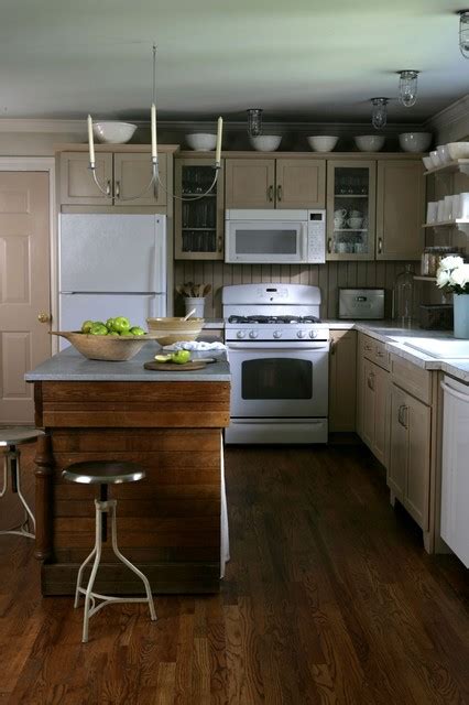 Consider brass, black, or creatively shaped pieces to give your kitchen a. industrial farmhouse kitchen on a budget
