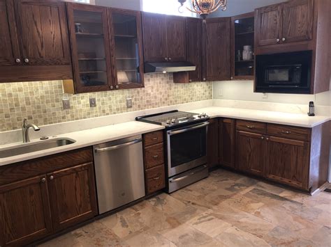 I had two holes in my kitchen with popcorn ceiling texture, these guys repaired it to brand new look and blended with very minimal mess. Cabinet Refacing | N-Hance of the Triad