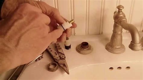 A leaking bathroom faucet is more annoying than dangerous. How To Fix A Leaky Delta Two Handle Faucet - YouTube