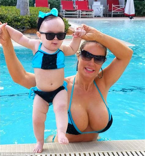 She has a bold look and fiery personality that matches that of her husband. Coco Austin and baby Chanel wear matching bikinis in Miami ...