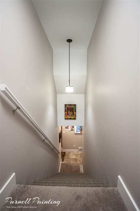 Stairwell painting tips and tools: stairwell painted warm grey with white ceiling