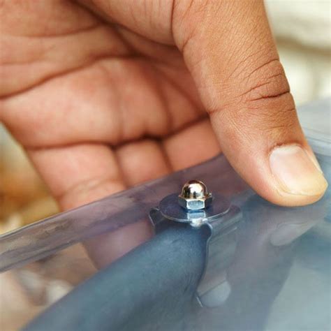 Simply mark the center line of the cover in 5 places on the top of the cover, drill. Install a Window-Well Cover