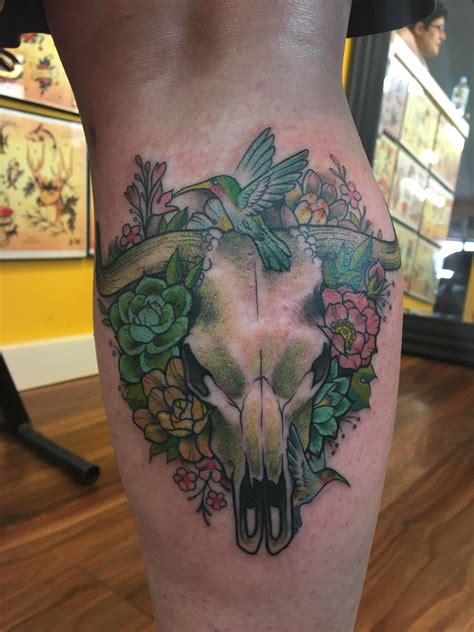 We're a local florist, offering fresh flowers across a wide range of stunning designs. Bull Skull with flowers and humming birds. By Tara at Rick ...