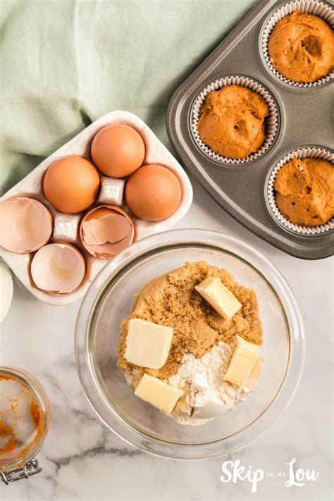 And this is all the trick you need! Pumpkin muffins that start with a cake mix YUM! | Skip To My Lou