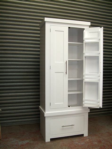 Elevate your space with practical storage solutions, ﻿perfect for a busy kitchen. Solid Pine cream painted kitchen larder pantry unit ...