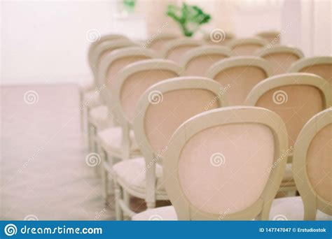 Maybe you would like to learn more about one of these? Blurred Background Of Row Of Beautiful Chairs Stock Image ...