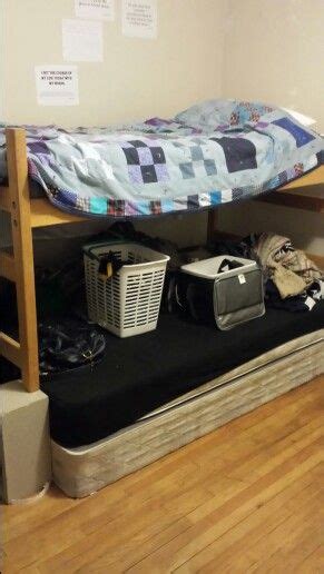 Create space for extra bed, desk. Homemade bunk bed. Used cinder blocks to raise this wood ...