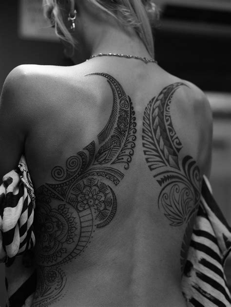 It tells a story and incorporates various other elements. full back maori or polynesian tribal designs