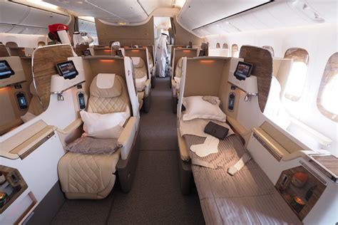 First section contains 2 rows of seats that have. plane: 22+ Boeing 777-300Er Business Class Emirates Pics